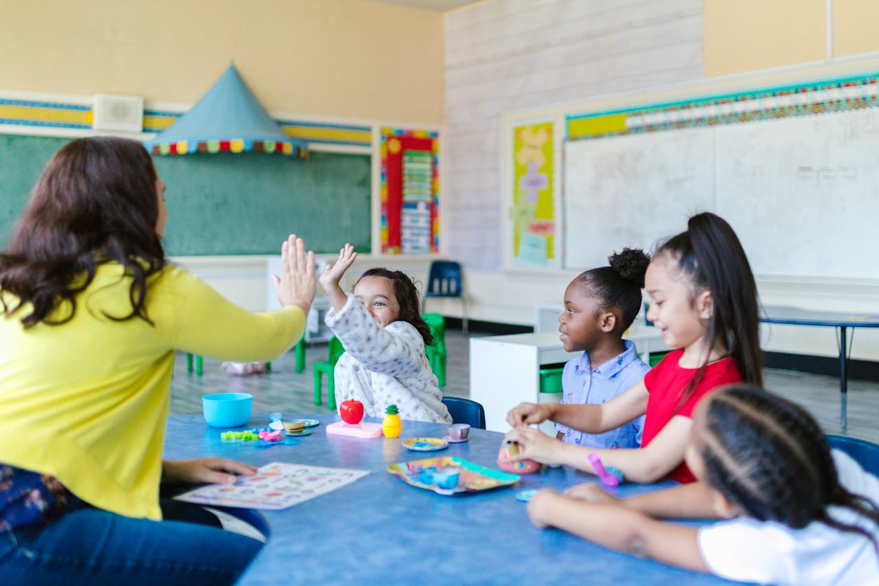 services-03 A joyful classroom scene with a teacher and diverse group of children engaging in playful learning activities.